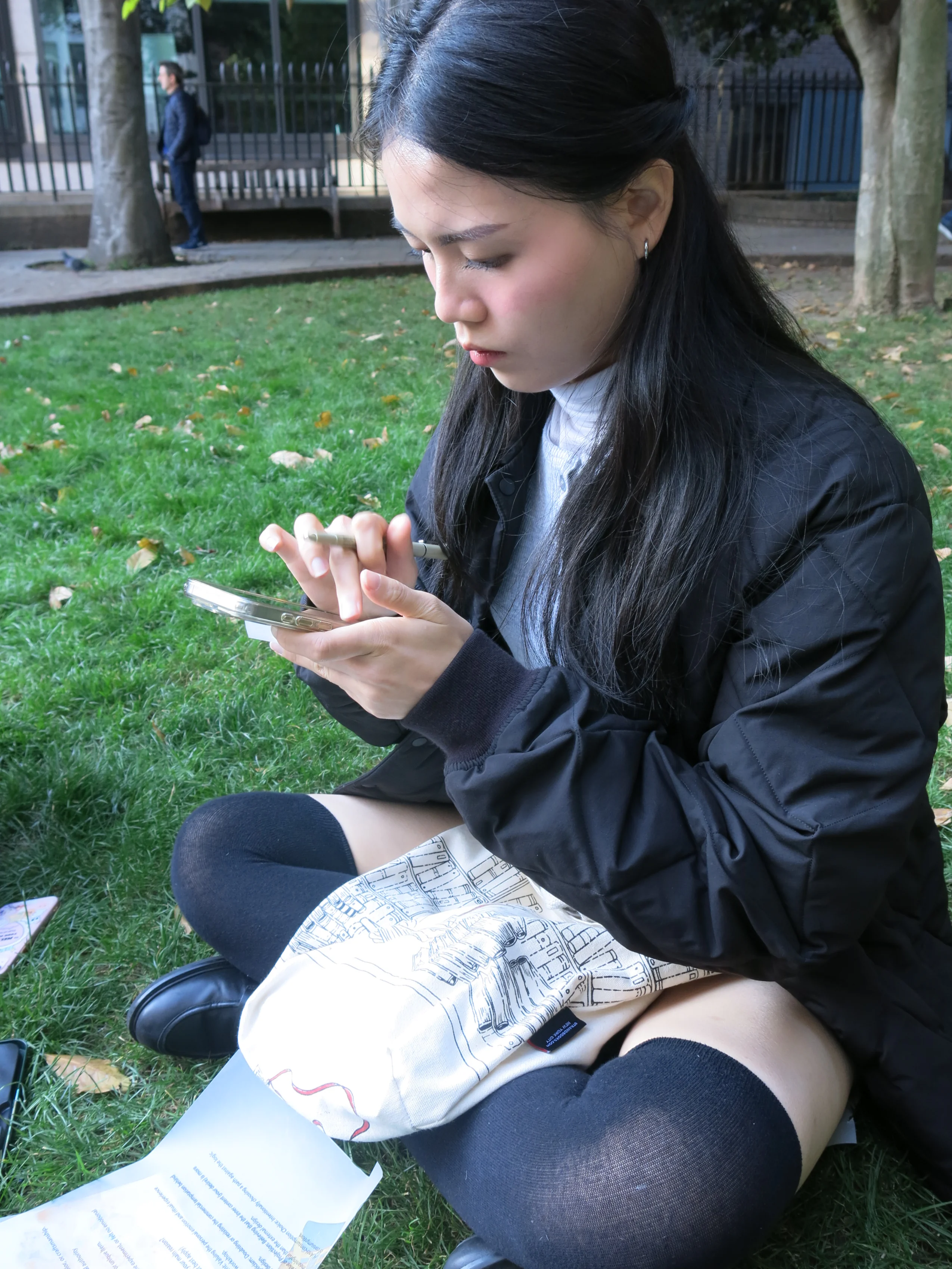 Workshop participant writing on a phone