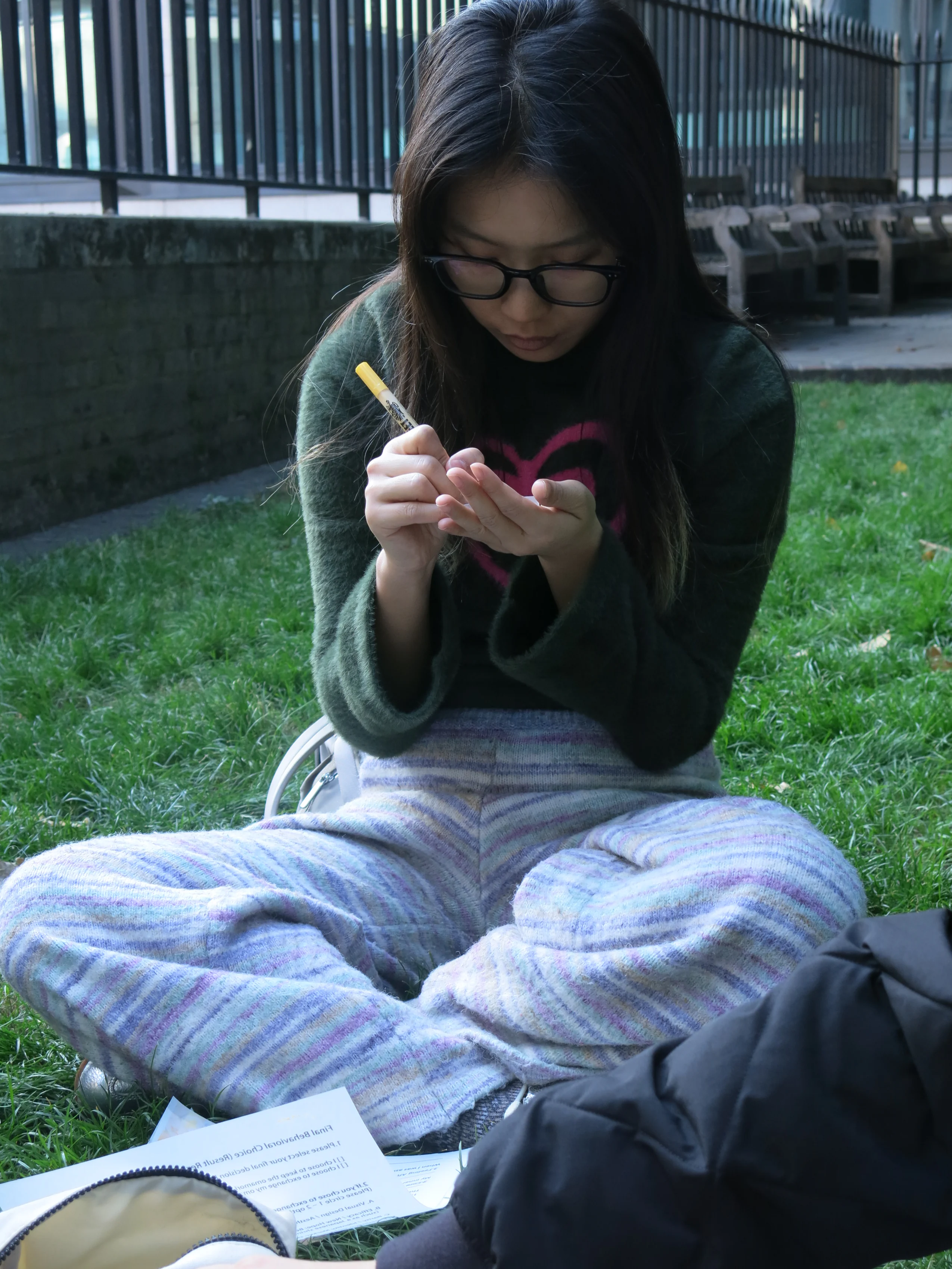 Workshop participant drawing a symbol